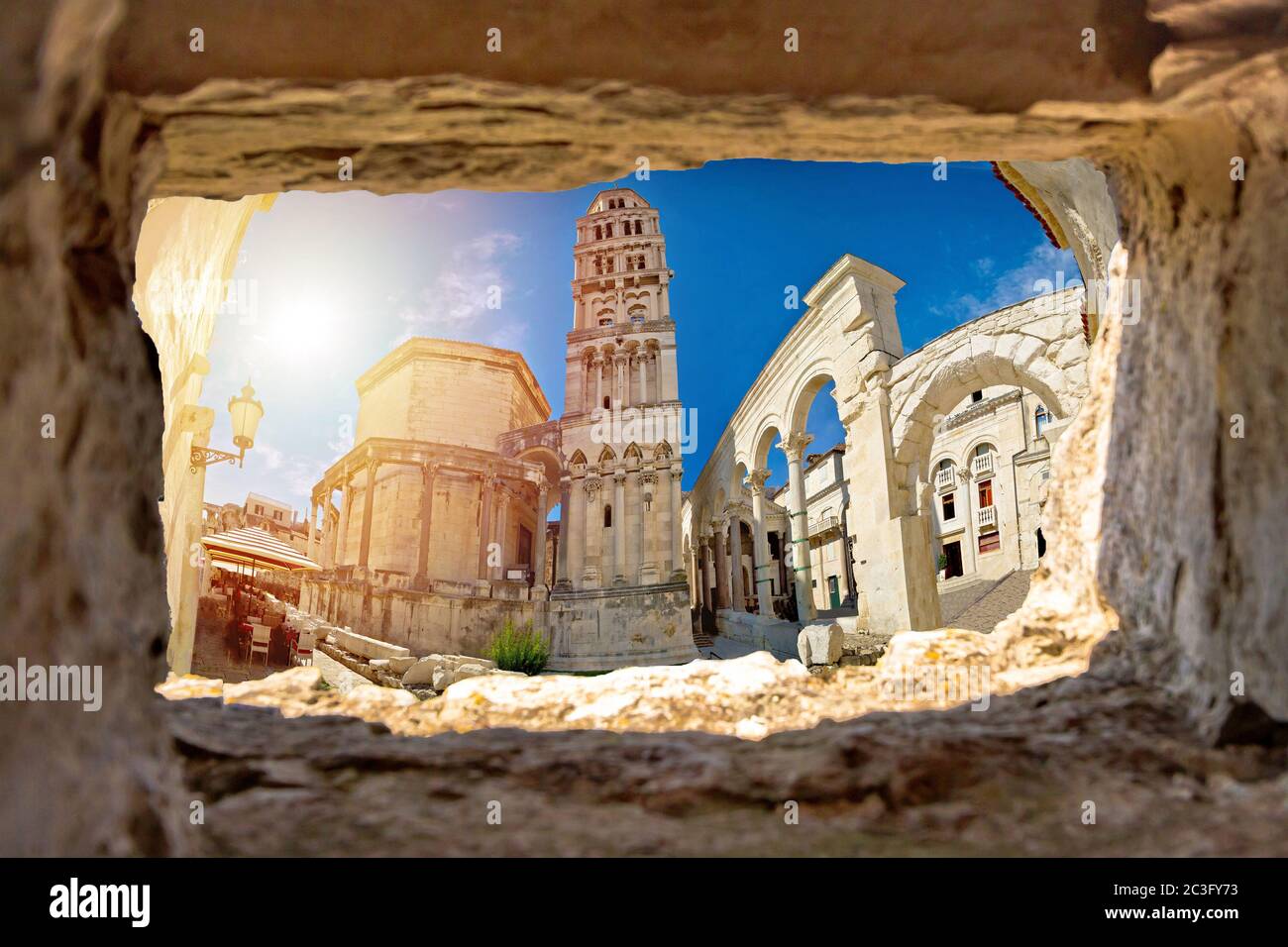 Ancien old Roman queen Jelena square and cathedral in Split view through stone window Stock Photo