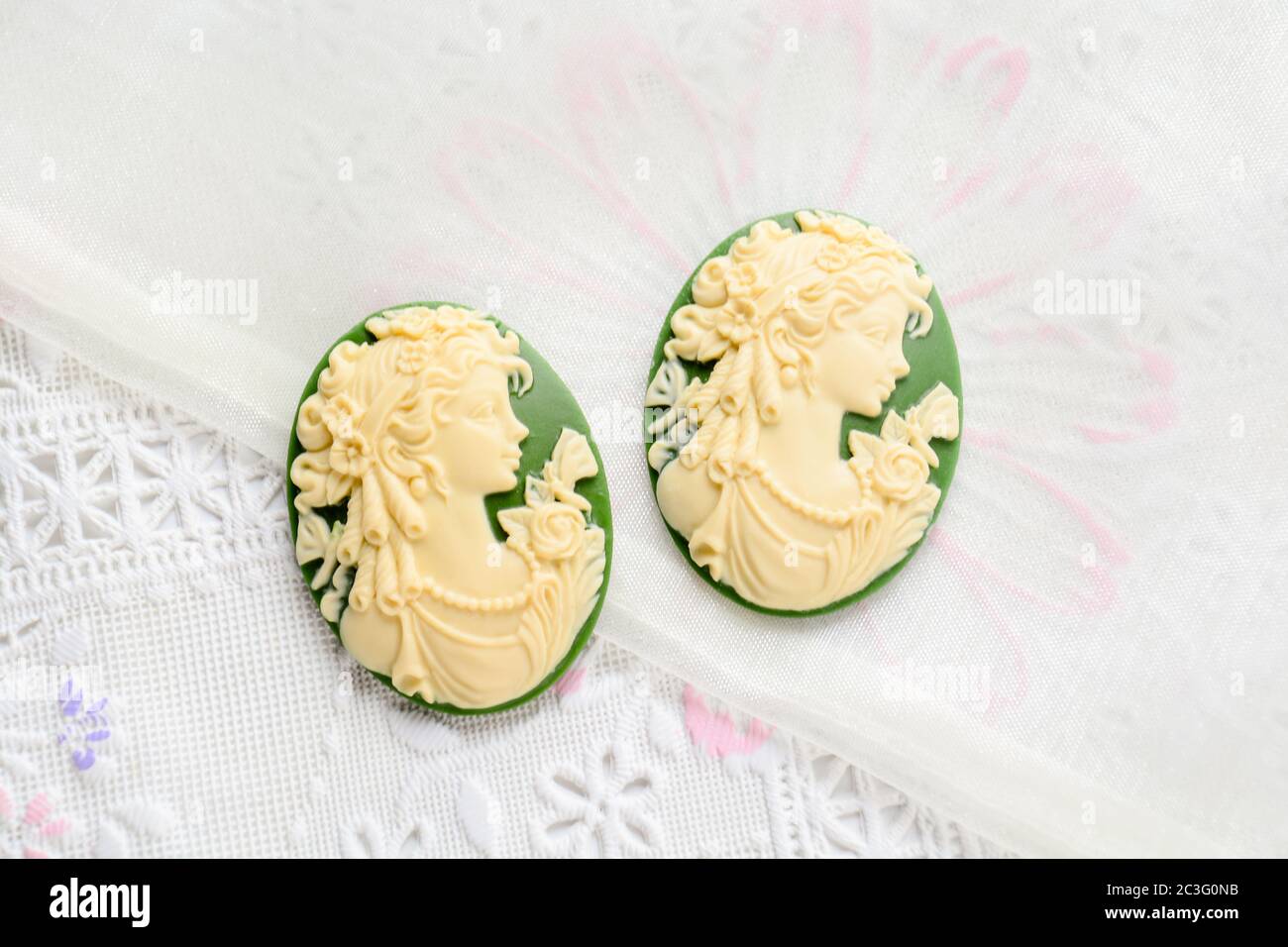 Antique cameo with ladies face, cameo brooch representing the side portrait of a woman Stock Photo
