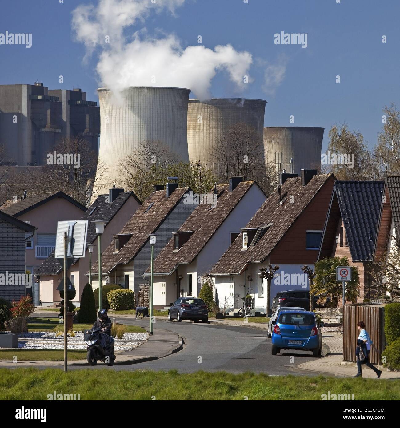 Housing development in front of the RWE Weisweiler power plant, Inden, Germany, Europe Stock Photo