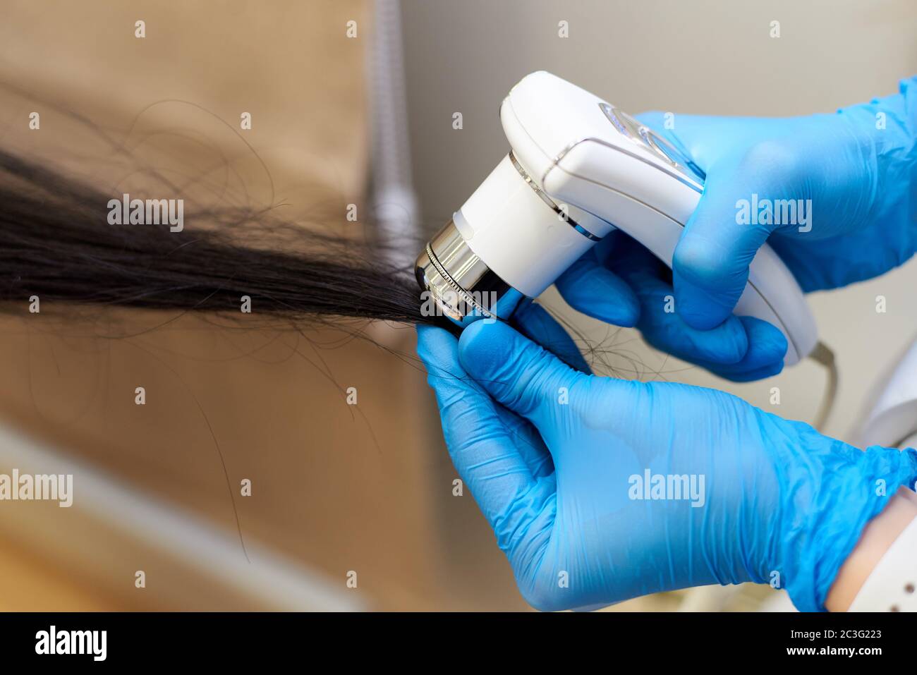 Microscopic examination of the hair and skin of the scalp Stock Photo