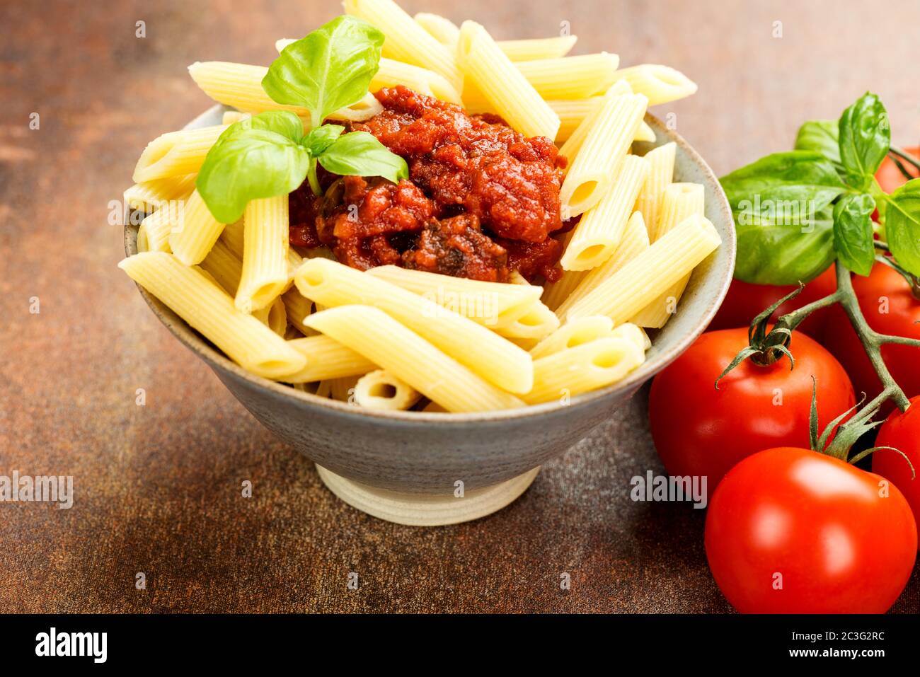 Penne pasta with a tomato bolognese beef sauce Stock Photo