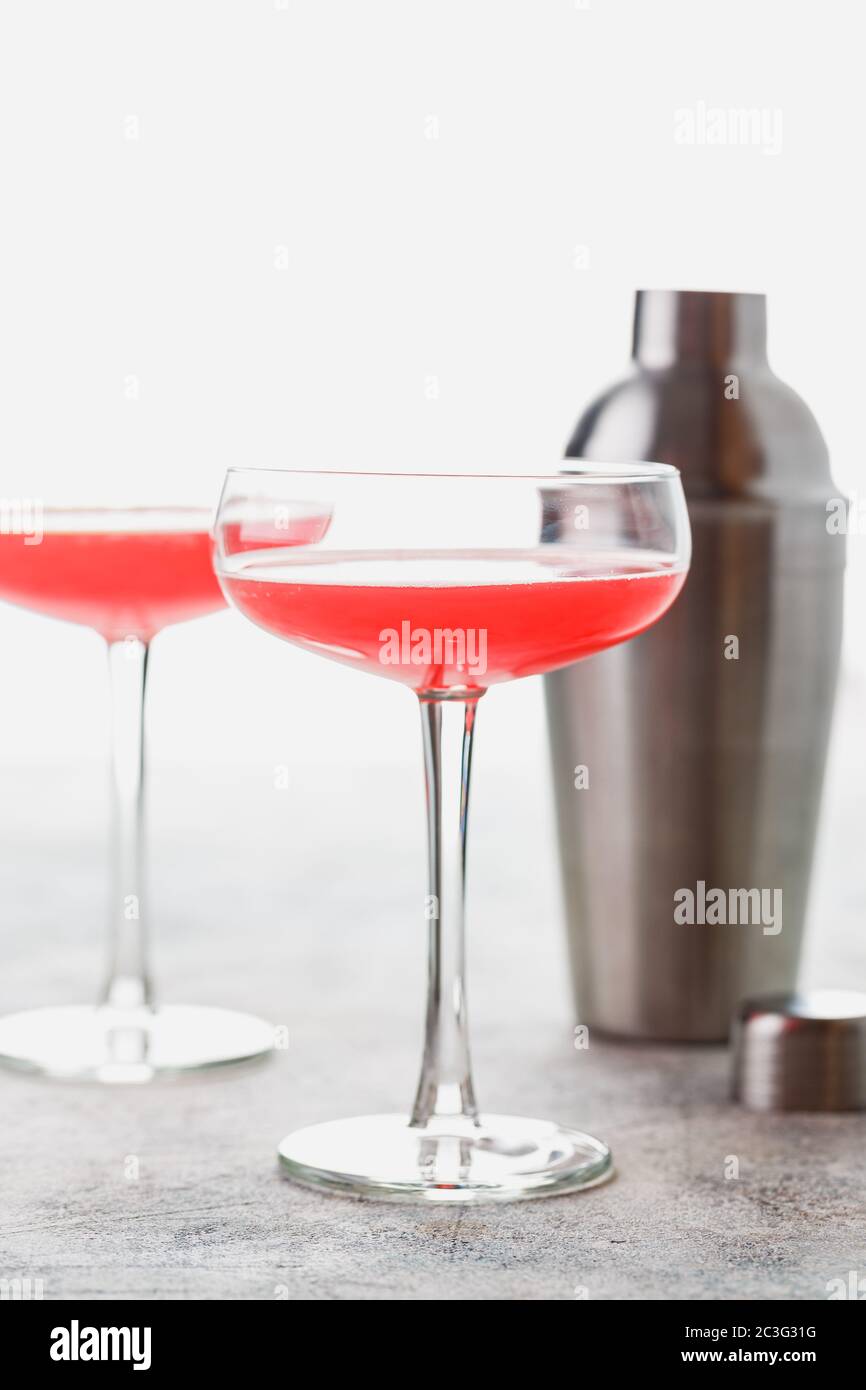 Pink Raspberry Cocktail in drink glass Stock Photo - Alamy