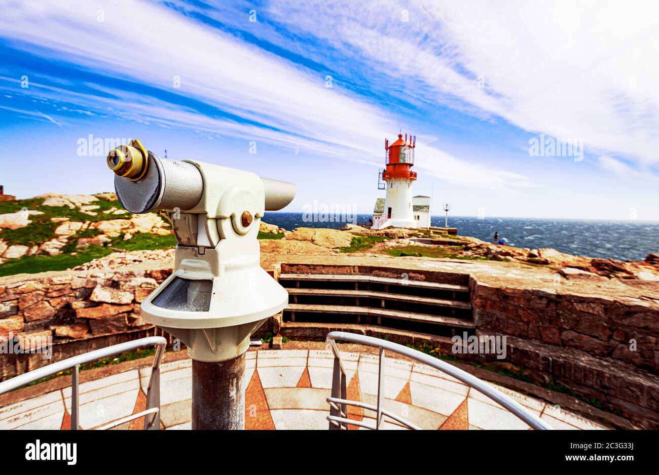 Observation telescope with Lindesnes Lighthouse Stock Photo