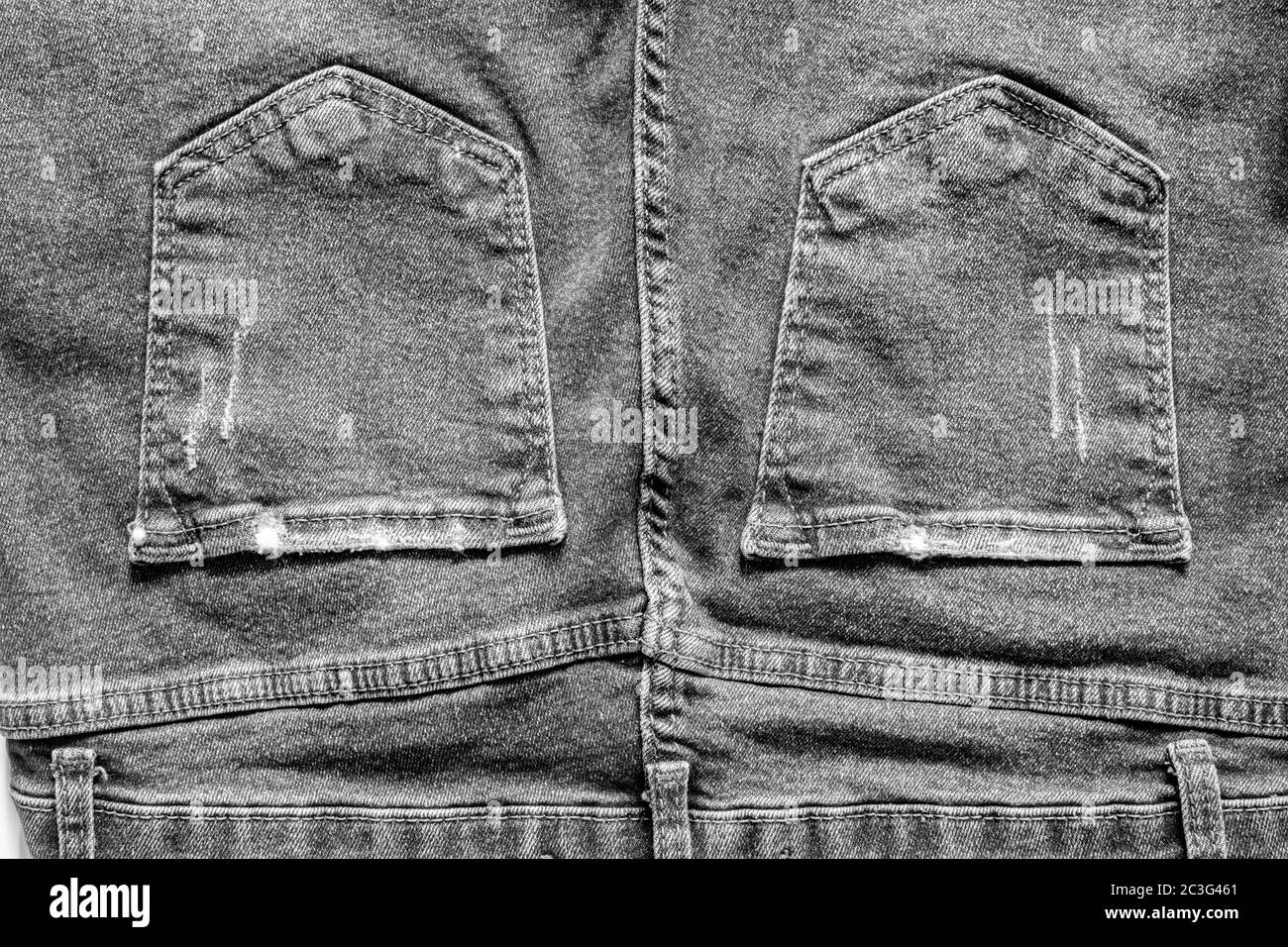 Details from jeans pants with seams and pockets Stock Photo