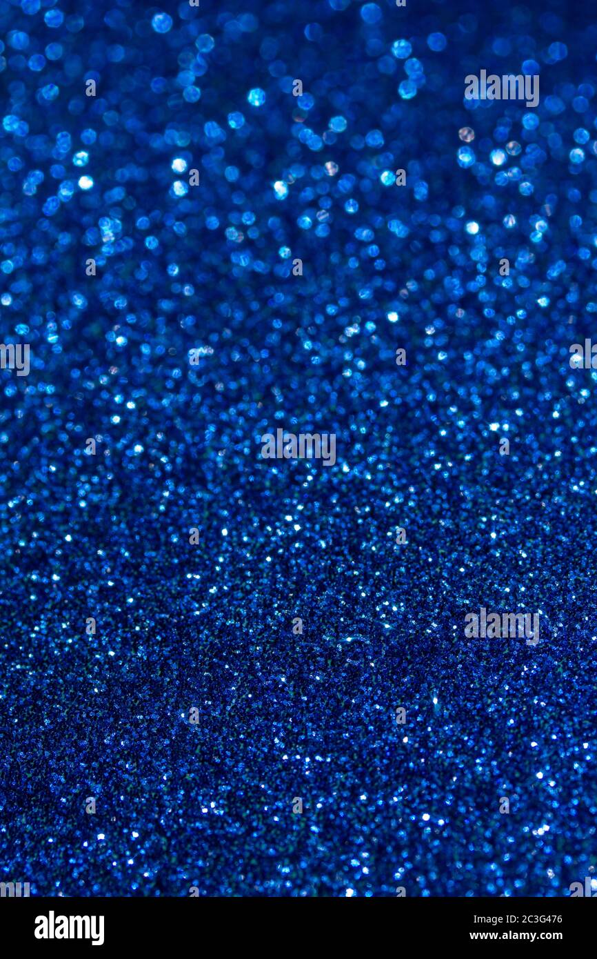 Abstract art background of sparkling white glitter texture, with bokeh