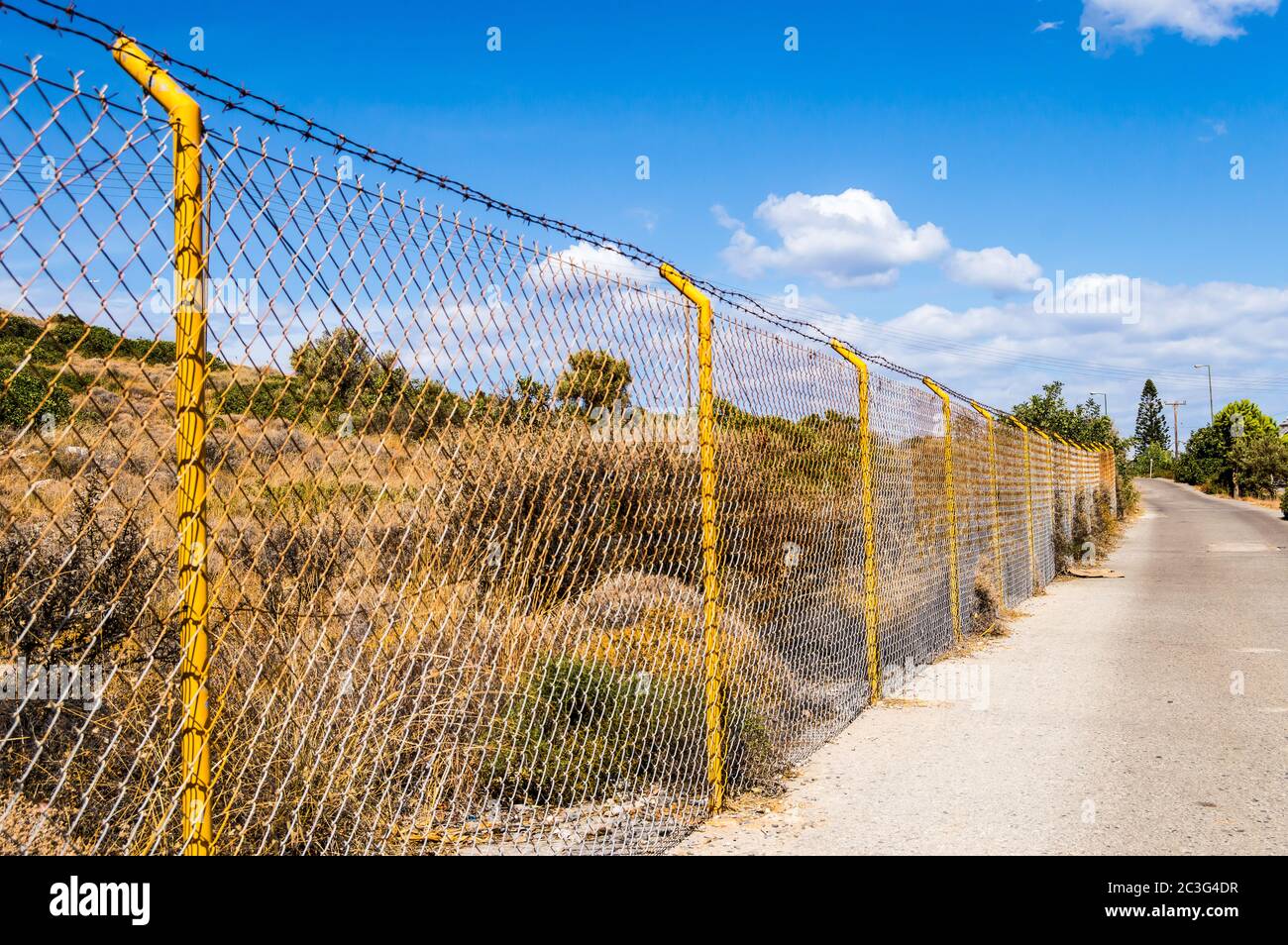Industrial metal fence hires stock photography and images Alamy