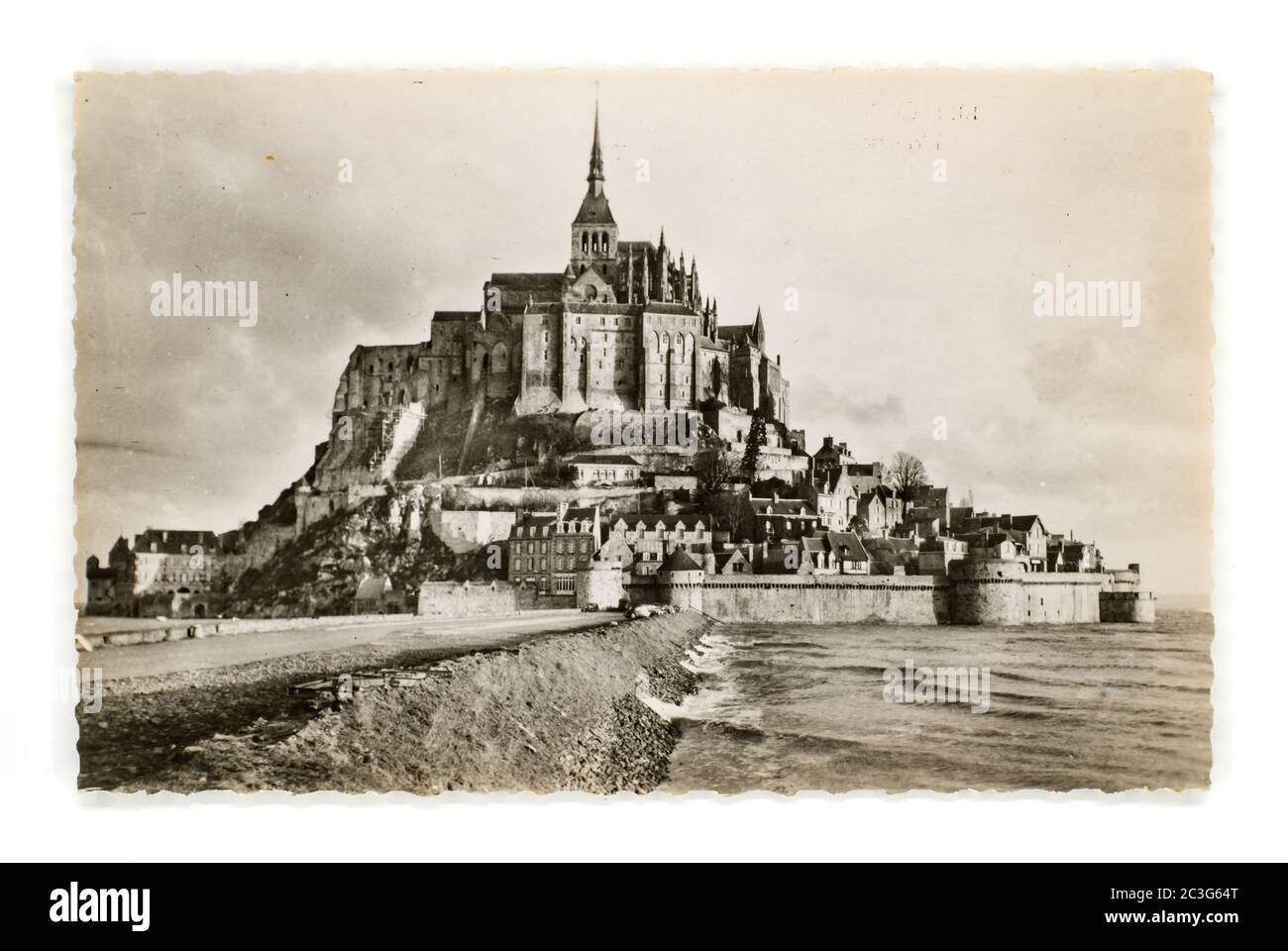 Sibiu City, Romania - 31 May 2020. postcard printed by France shows Mont Saint Michel cathedral on the island, Normandy, Northern France, Europe, circ Stock Photo