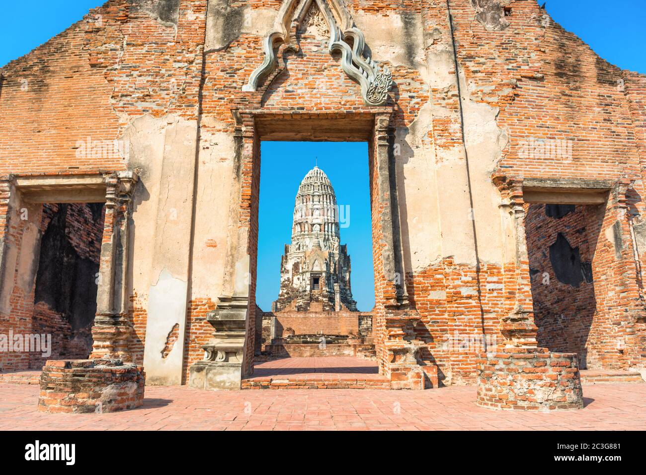 Brick wall and remains of Wat Mahathat temple Stock Photo