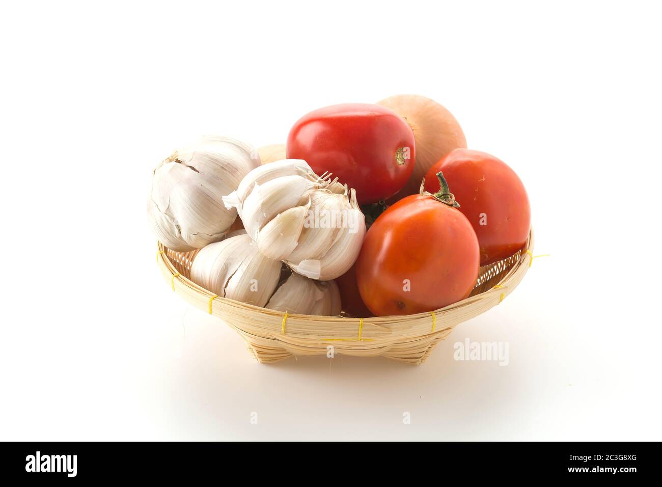 tomatoes, onion and garlic in basket Stock Photo - Alamy