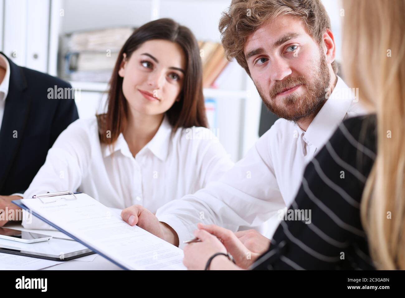 Teamwork discusses problems in the workplace Stock Photo