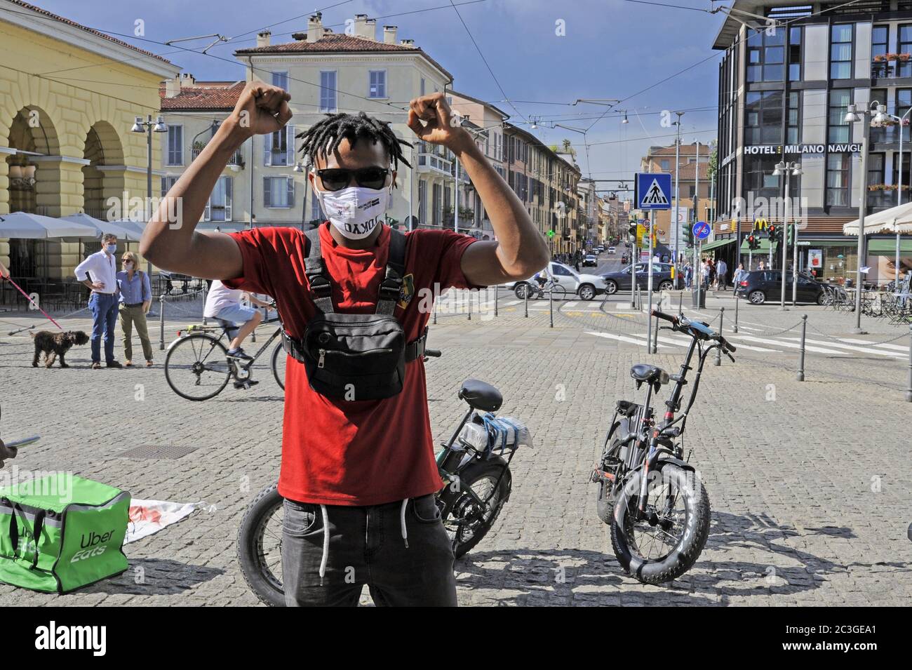 Milan, protest of the riders, bike messengers for home delivery of the food,  for the working conditions and against the decision of the regional transport company Trenord to no longer allow bicycles on trains Stock Photo