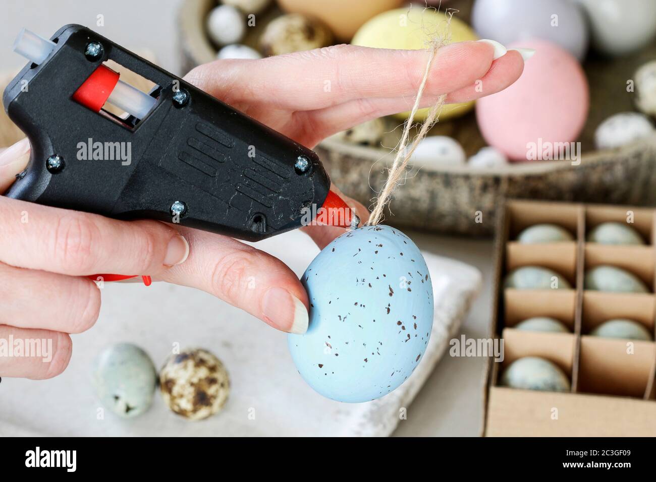 How to make hanging Easter eggs. Step by step, tutorial. Festive decor Stock Photo
