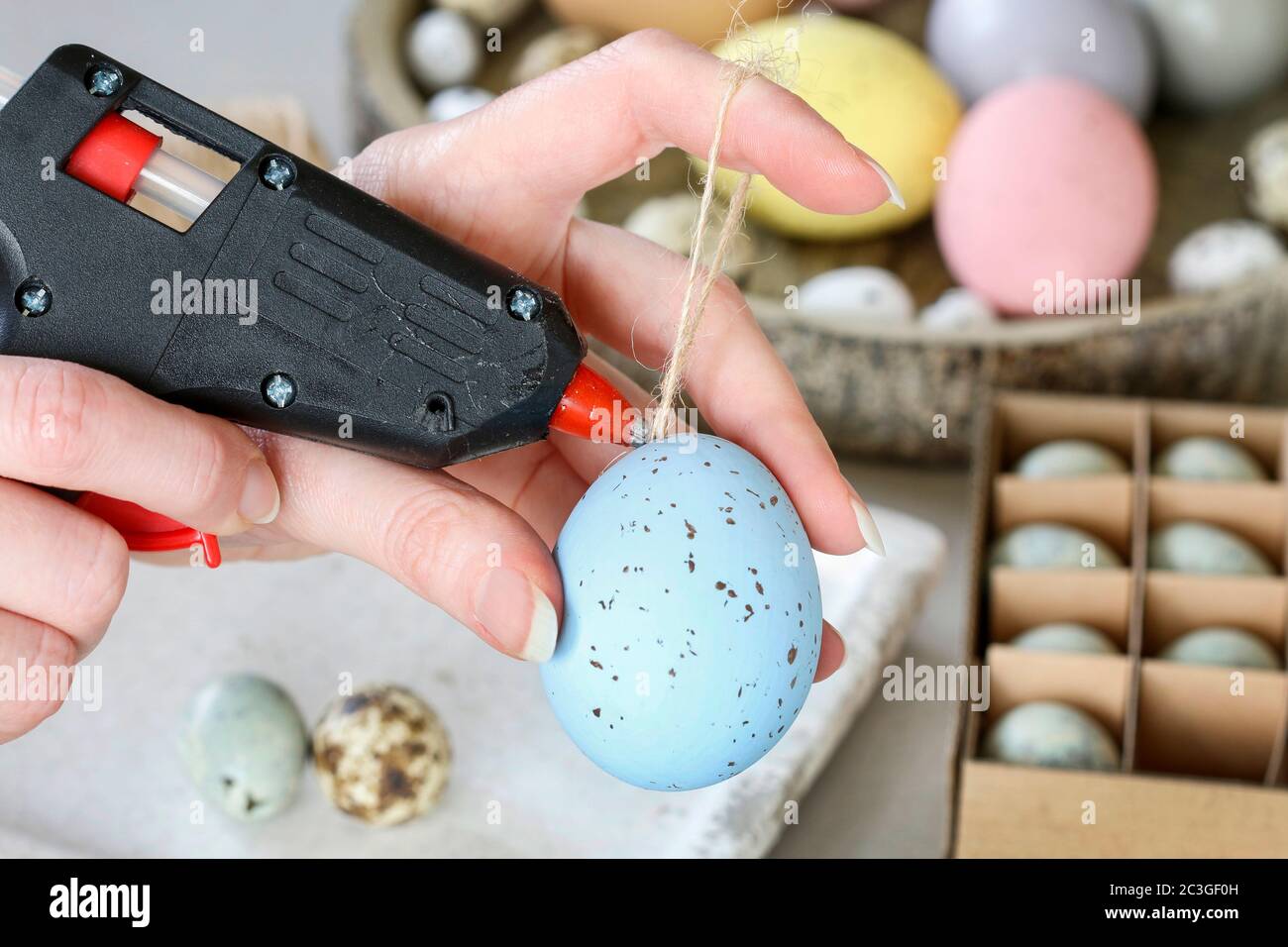How to make hanging Easter eggs. Step by step, tutorial. Festive decor Stock Photo