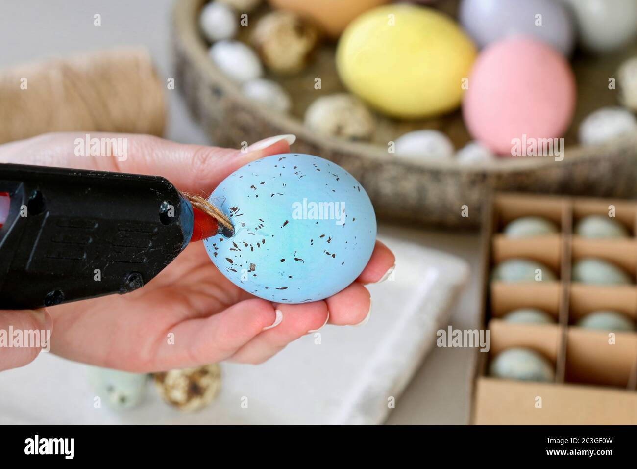 How to make hanging Easter eggs. Step by step, tutorial. Festive decor Stock Photo