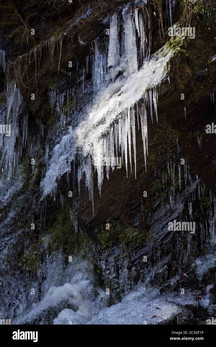 Icicles at the Plaesterlegge waterfall in winter, Bestwig, Sauerland, Germany, Europe Stock Photo