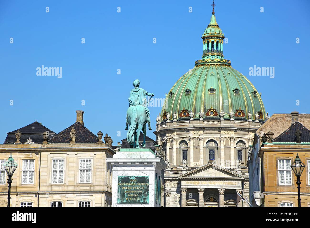 Amalienborg Palace Square with a statue of Frederick V on a horse. It is at the centre of the  Amalienborg palace, Copenhagen, Denmark. Stock Photo