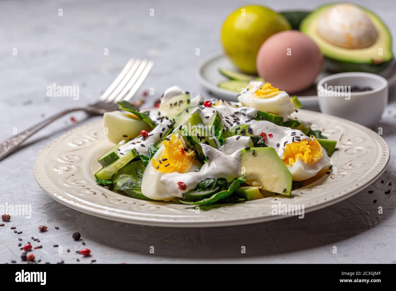 Healthy salad of green vegetables and eggs. Stock Photo