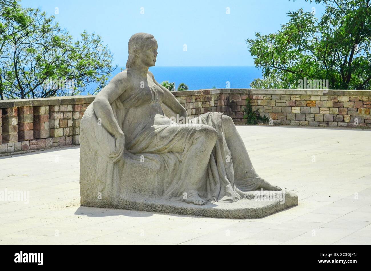stone statue of a seated woman in Miramar on Mount Montjuïc. Barcelona ...