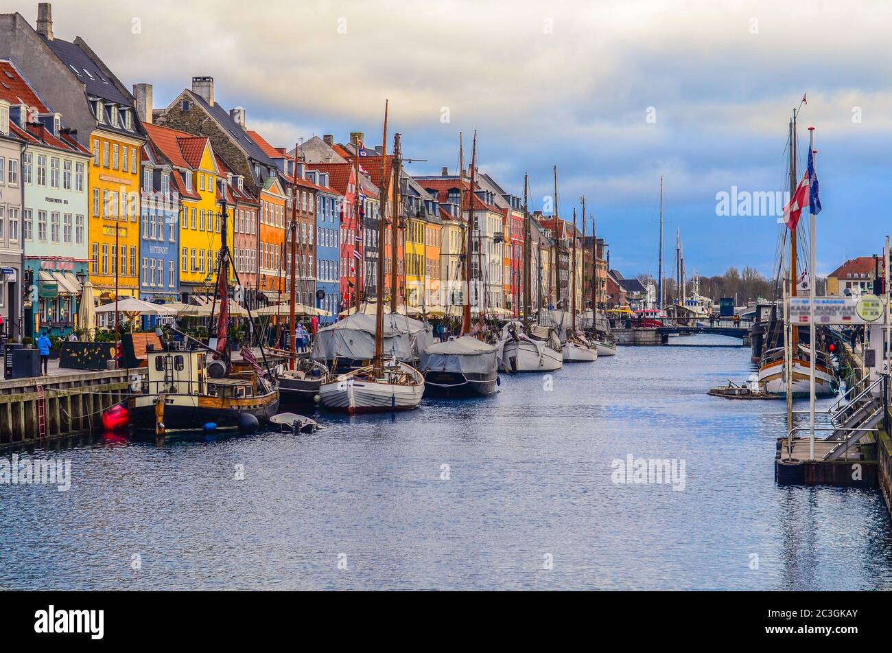 View of Nyhavn pier with color buildings and ships in Copenhagen, Denmark Stock Photo
