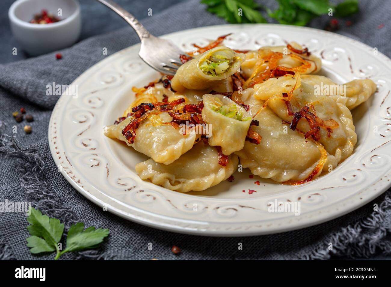 Dumplings stuffed with stewed cabbage and onions. Stock Photo