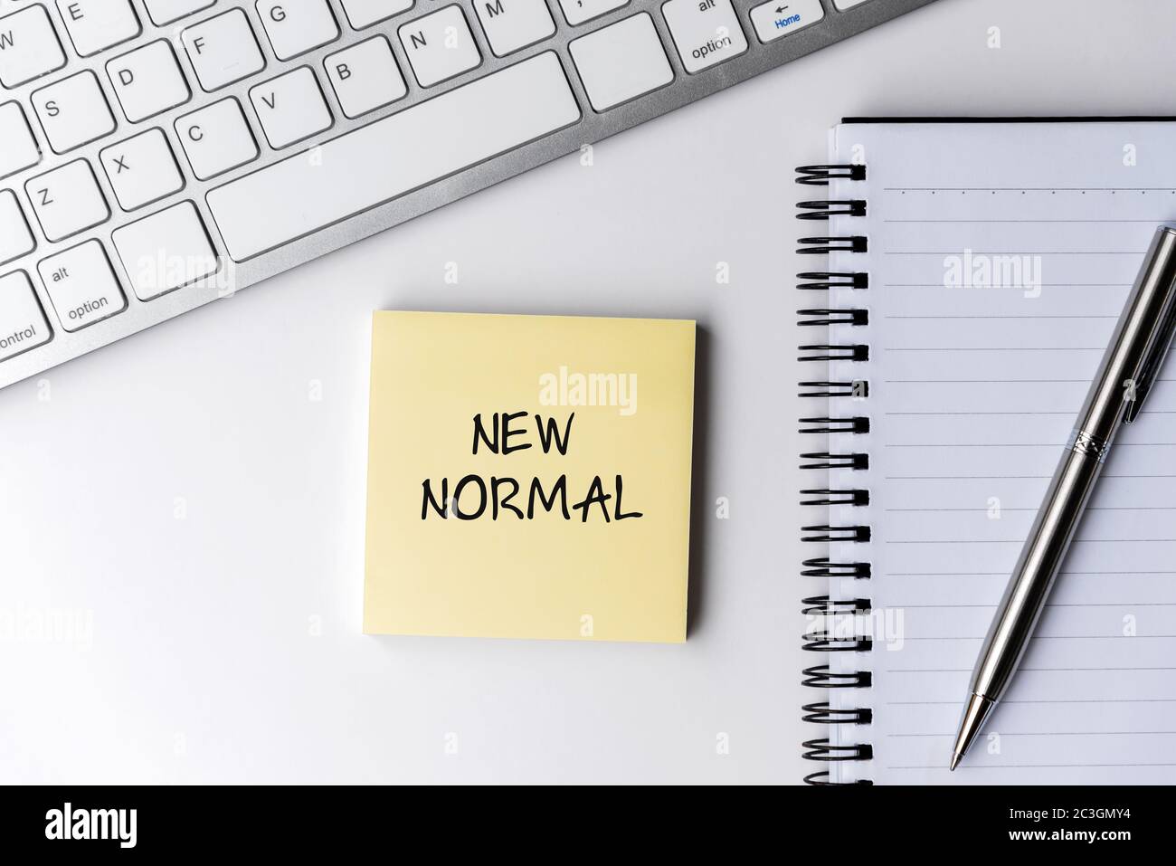 New normal text on sticky note with computer keyboard and pen Stock ...