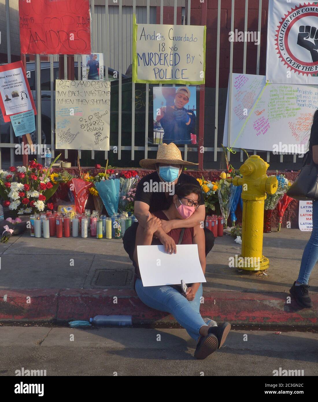 Los Angeles, United States. 20th June, 2020. Family members mourn the death of 18-year-old student and security guard Andres Guardado at a makeshift memorial near the spot where he was fatally shot by an L.A. County sheriff's deputy Thursday evening in Gardena, California on Friday, June 19, 2020. Family members and some community activists said Friday that the shooting was unjustified and are demanding answers. Photo by Jim Ruymen/UPI Credit: UPI/Alamy Live News Stock Photo