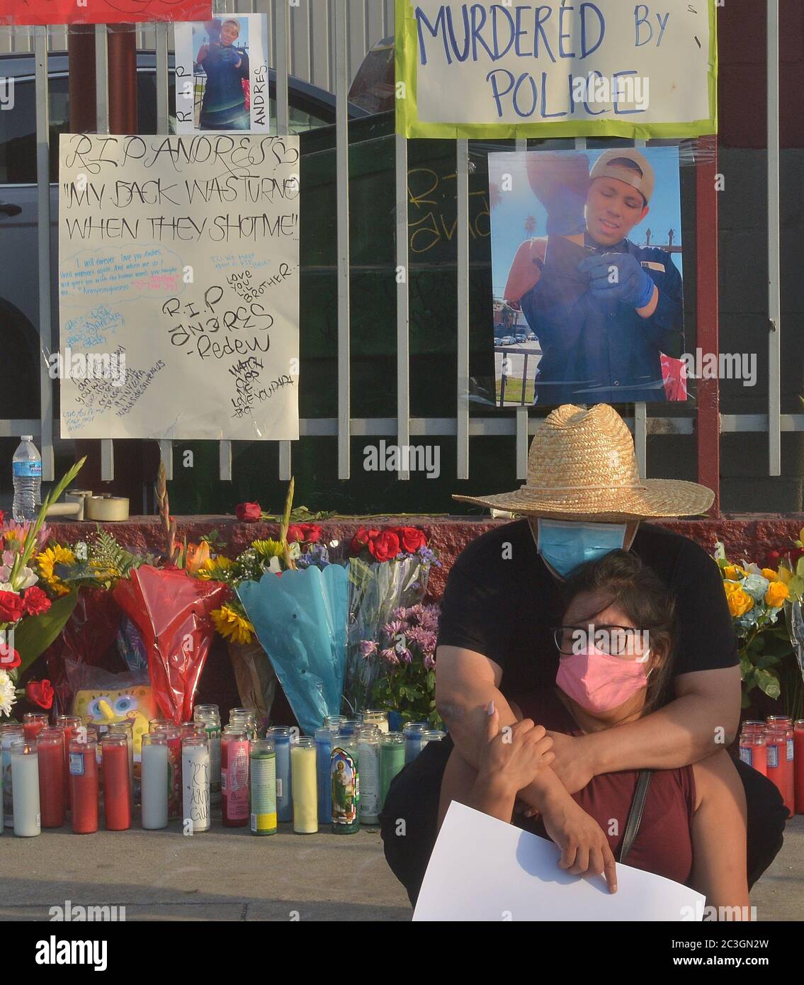 Los Angeles, United States. 20th June, 2020. Family members mourn the death of 18-year-old student and security guard Andres Guardado at a makeshift memorial near the spot where he was fatally shot by an L.A. County sheriff's deputy Thursday evening in Gardena, California on Friday, June 19, 2020. Family members and some community activists said Friday that the shooting was unjustified and are demanding answers. Photo by Jim Ruymen/UPI Credit: UPI/Alamy Live News Stock Photo