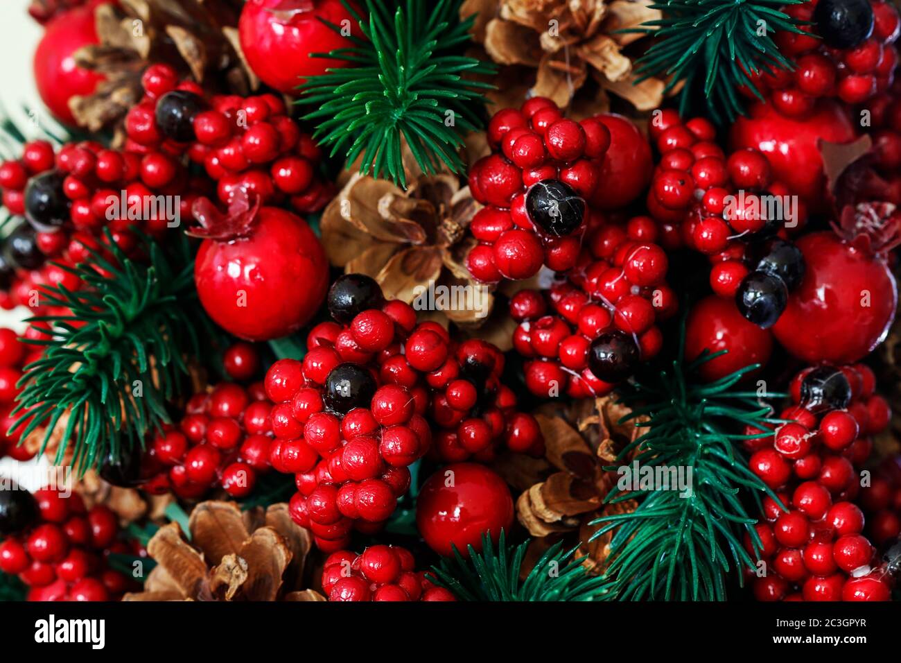 Christmas background with red berries, cones and fir twigs. Graphic ...