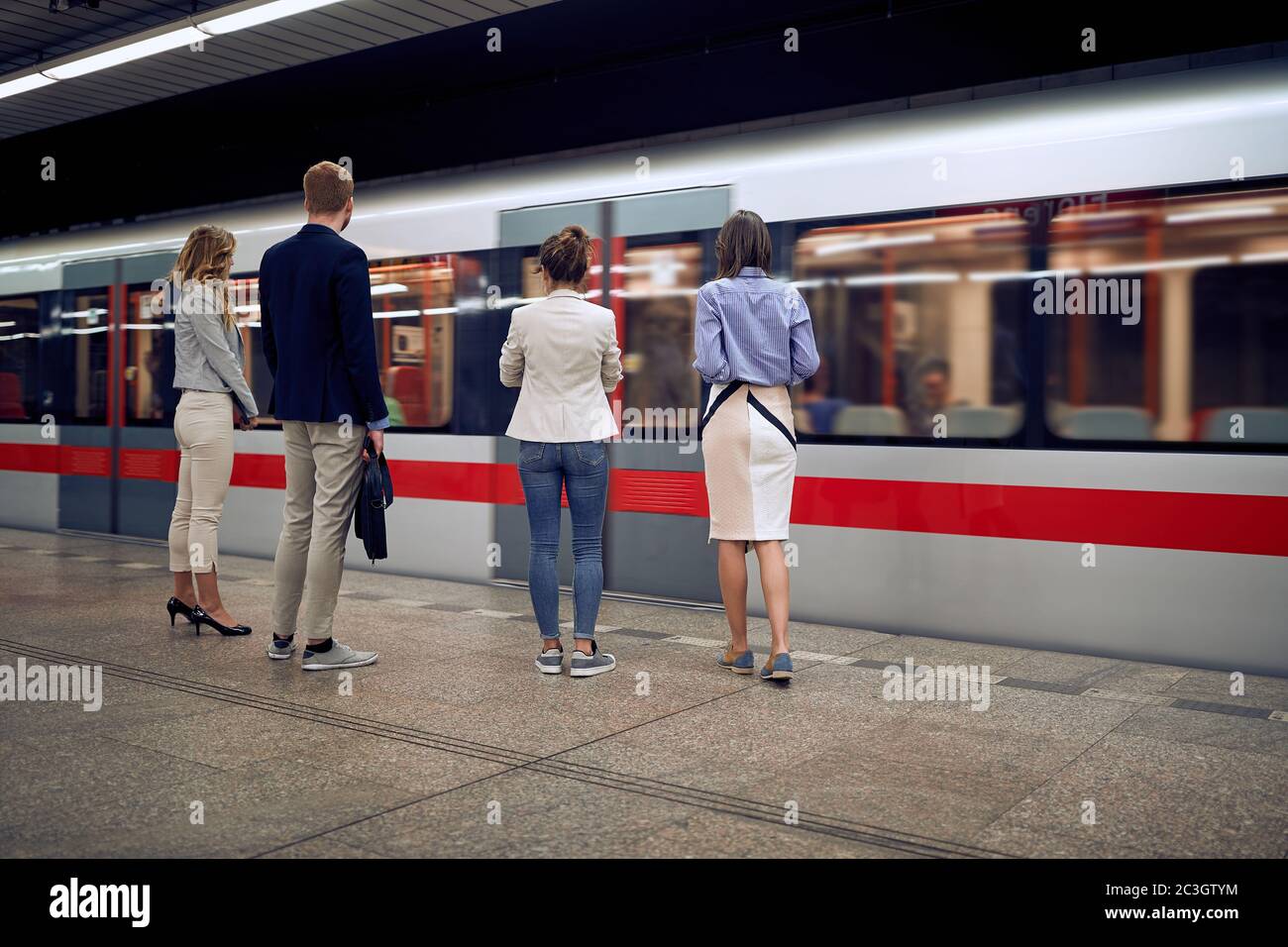 People standing waiting train hi-res stock photography and images - Alamy