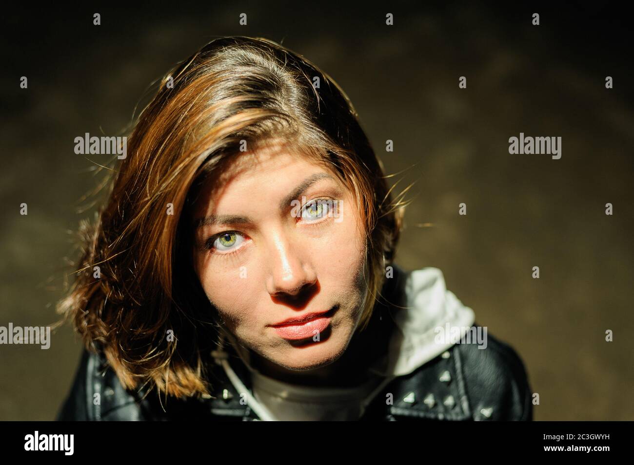 face of a cute girl with black hair and big beautiful eyes Stock Photo