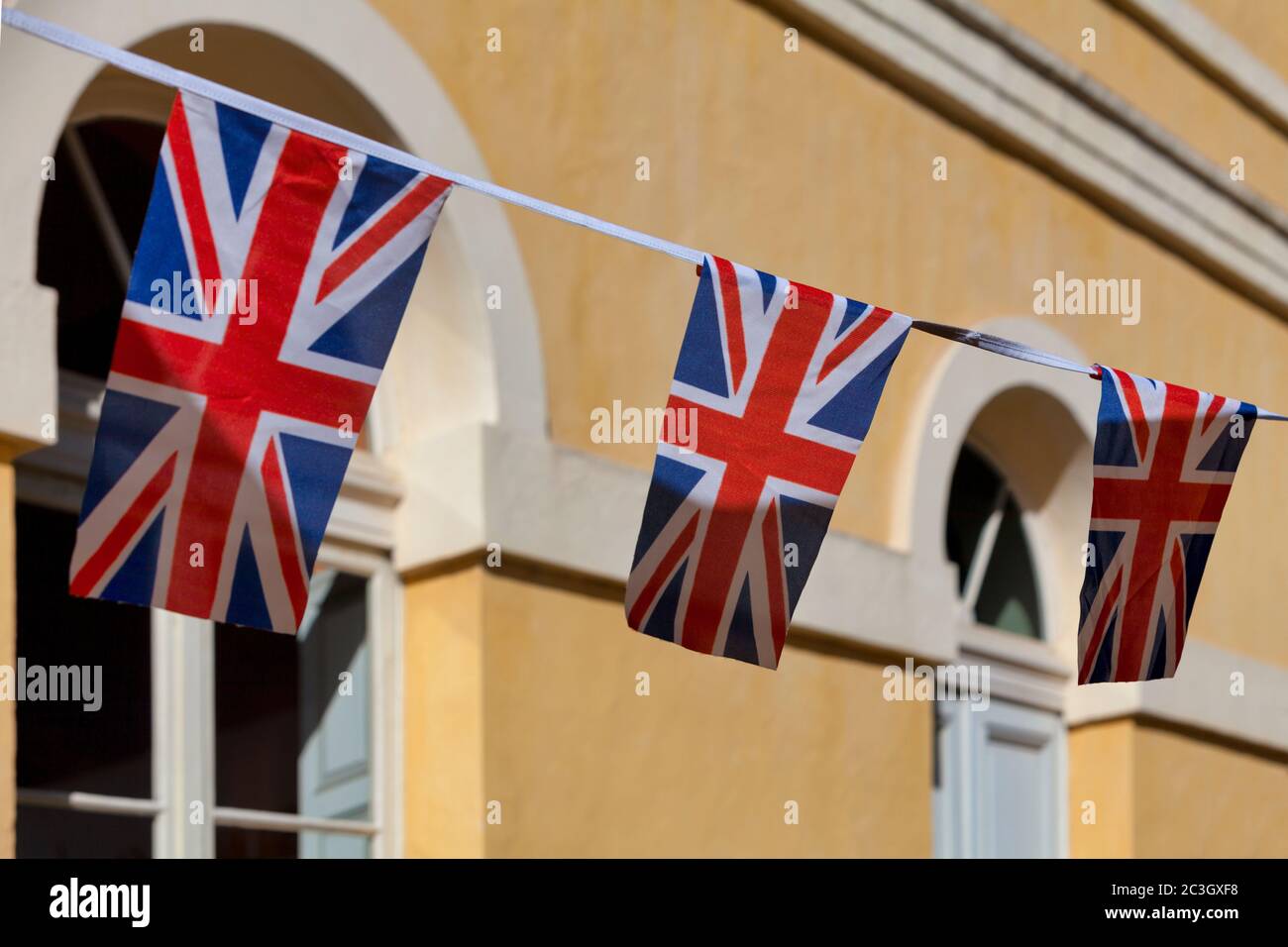 Red, white and blue british flag bunting to celebrate the VE Day. Stock Photo