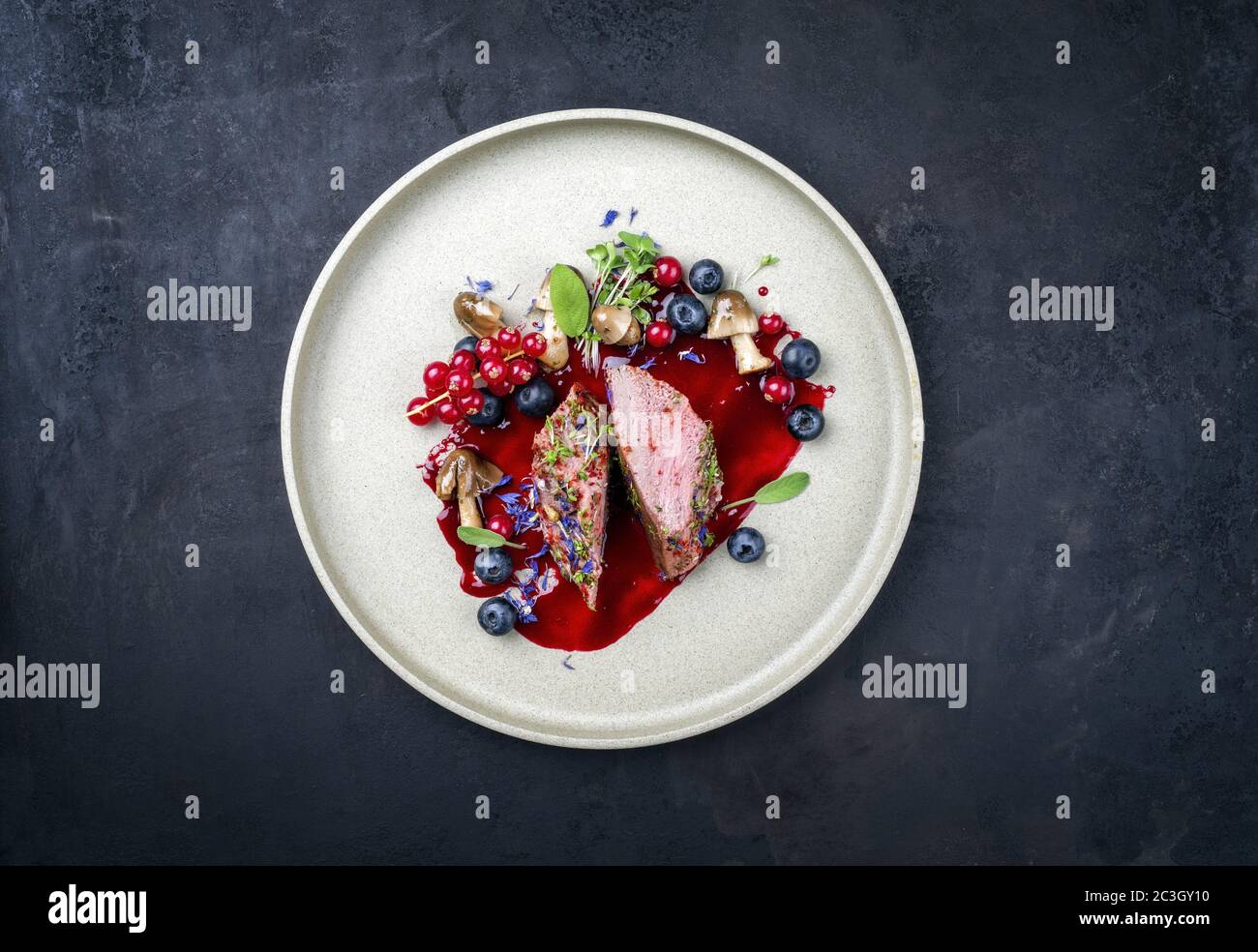 Fried dry aged venison tenderloin fillet medallion steak natural with