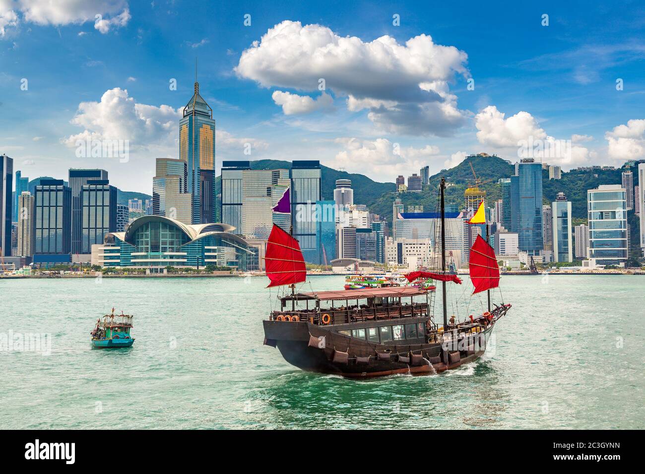 Traditional Chinese wooden sailing ship in Victoria Harbour in Hong Kong at summer day Stock