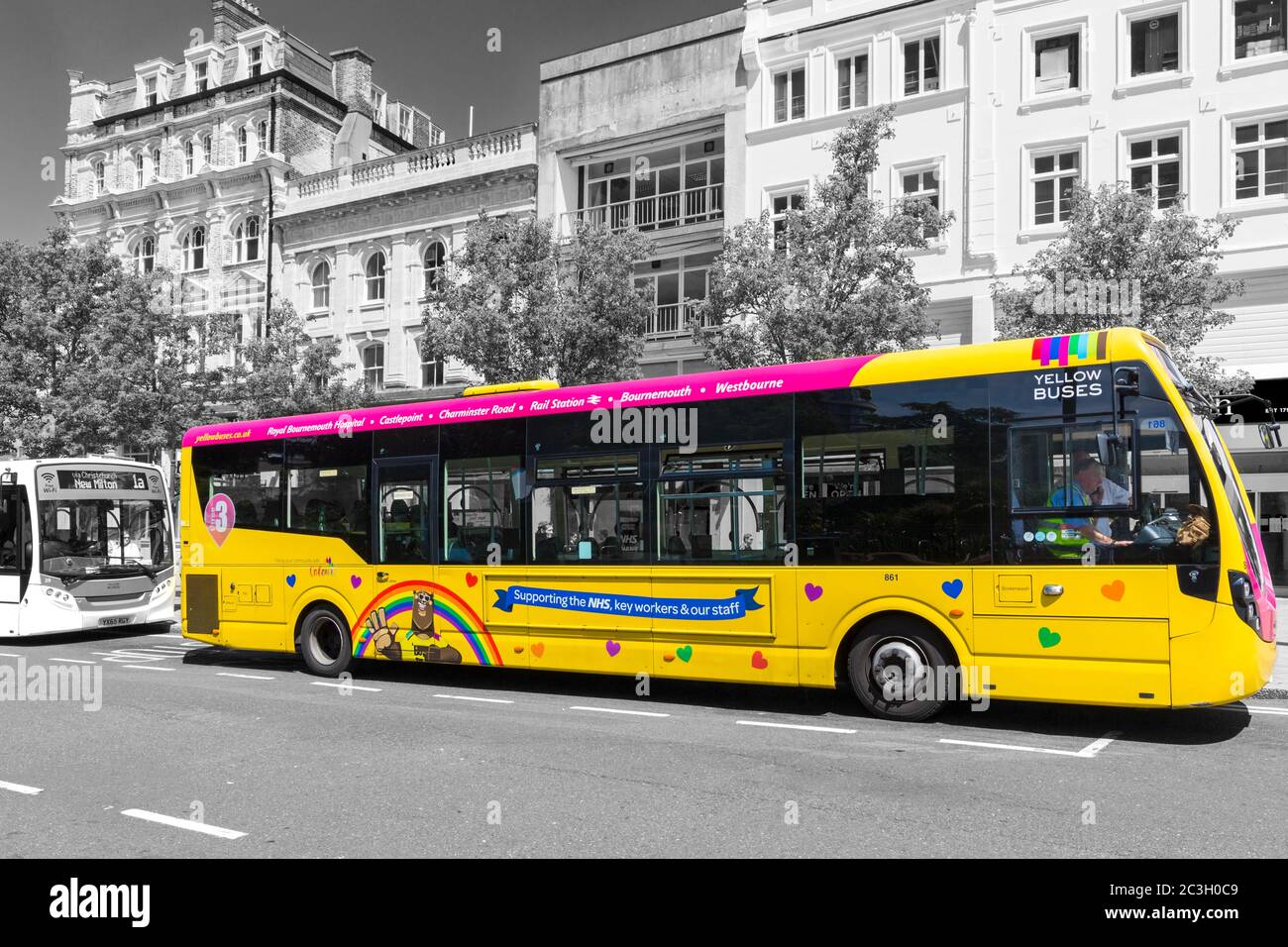 Yellow Buses bus showing support for keyworkers during Coronavirus Covid 19 pandemic at Bournemouth, Dorset UK in June Stock Photo