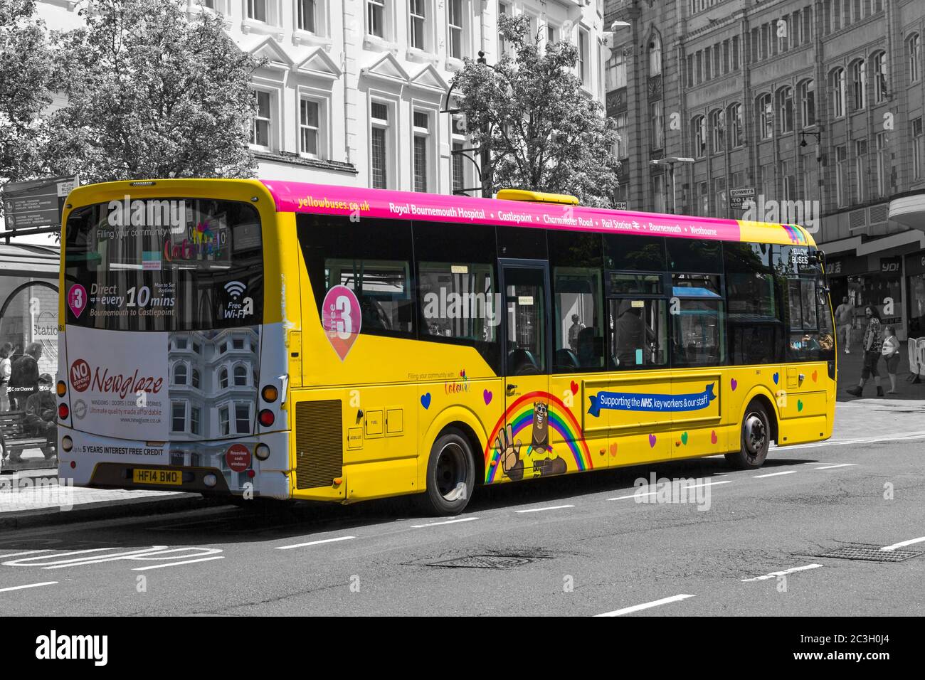 Yellow Buses bus showing support for keyworkers during Coronavirus Covid 19 pandemic at Bournemouth, Dorset UK in June Stock Photo