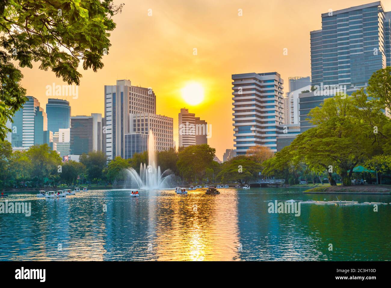 View of Lumphini park at sunset in Bangkok, Thailand Stock Photo