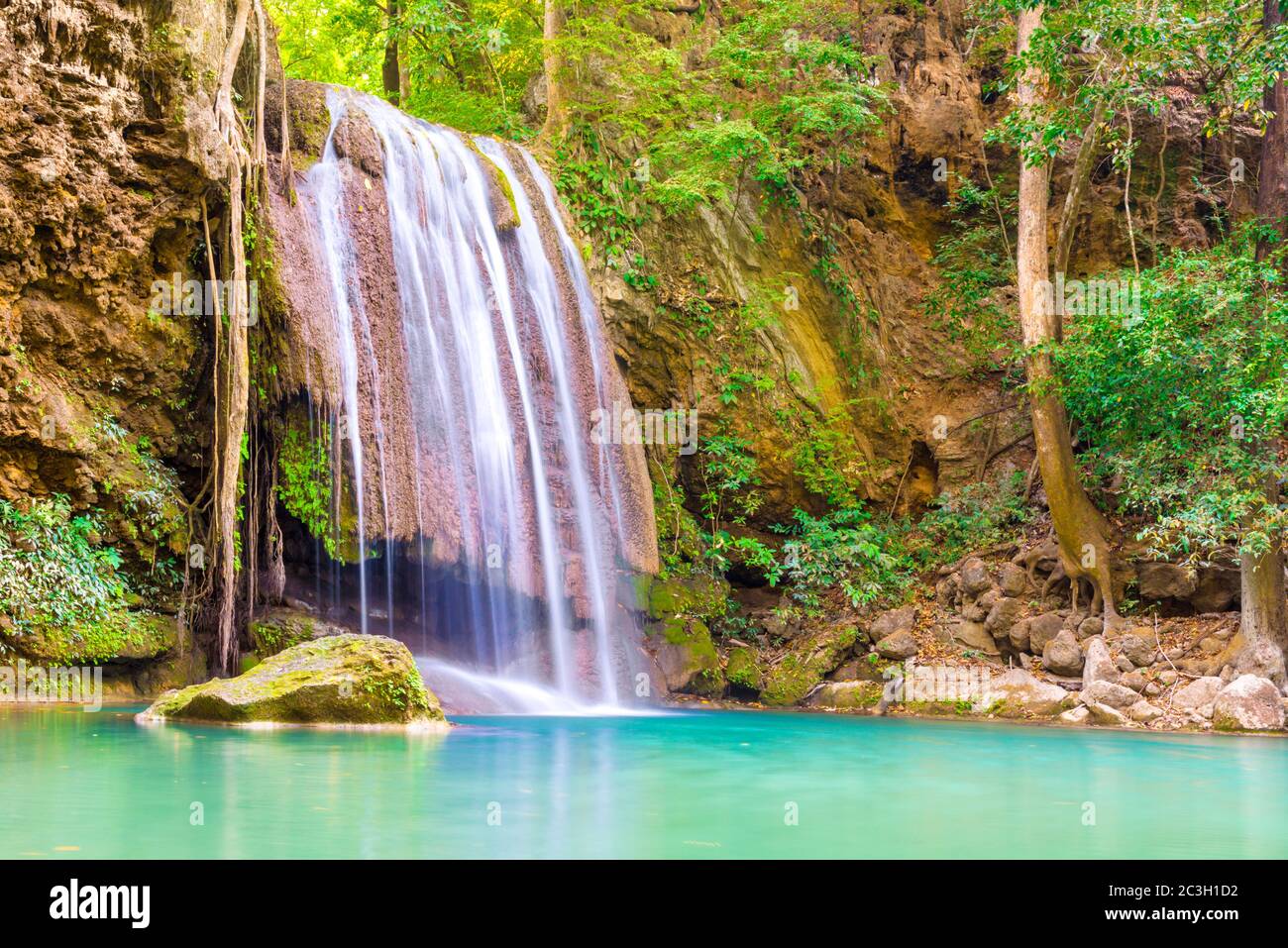 Beautiful waterfall in wild rainforest in Erawan National park, Thailand Stock Photo