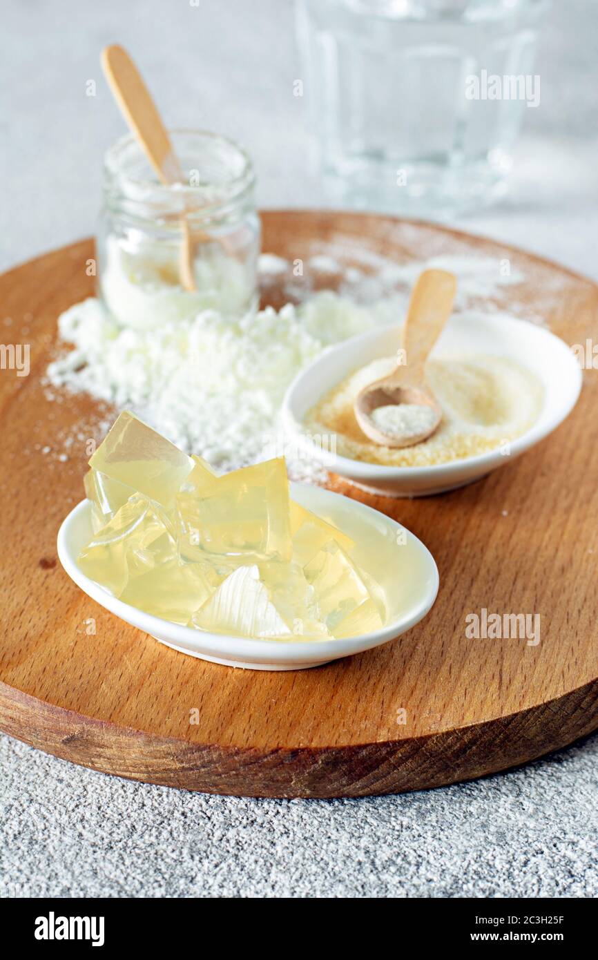 Products (collagen powder, gelatin, ) which contain collagen. Collagen powder on a light