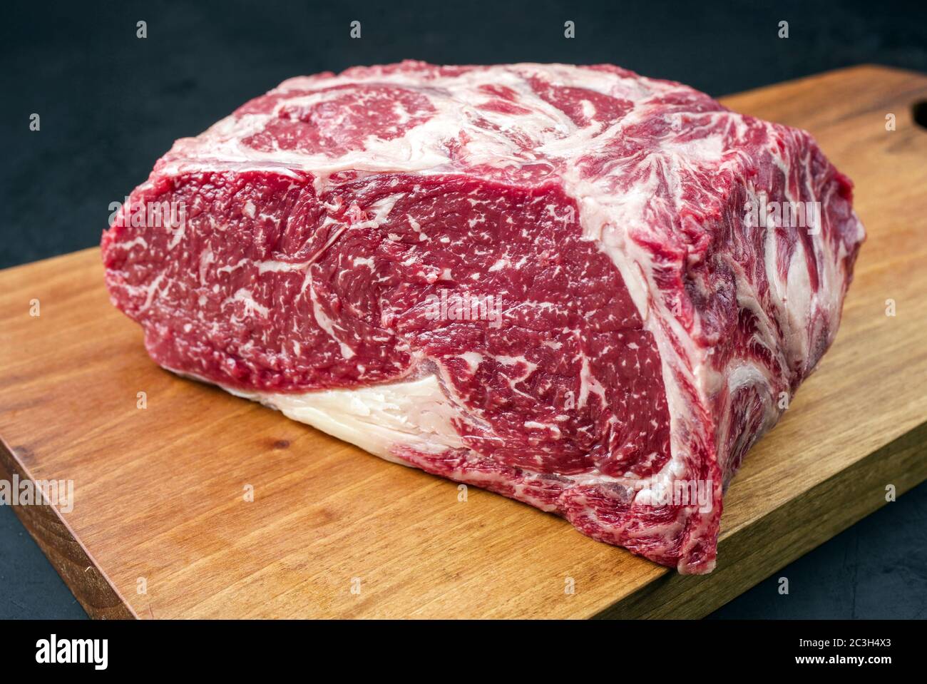 Raw dry aged wagyu entrecote beef steak roast as closeupon a modern