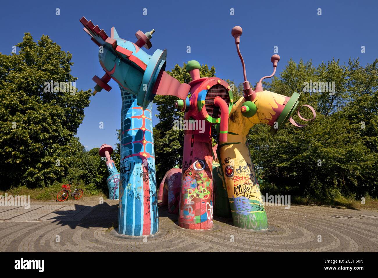 Nessy-Family, the sea monsters blow air for fresh air into the underground canal, Duesseldorf Stock Photo