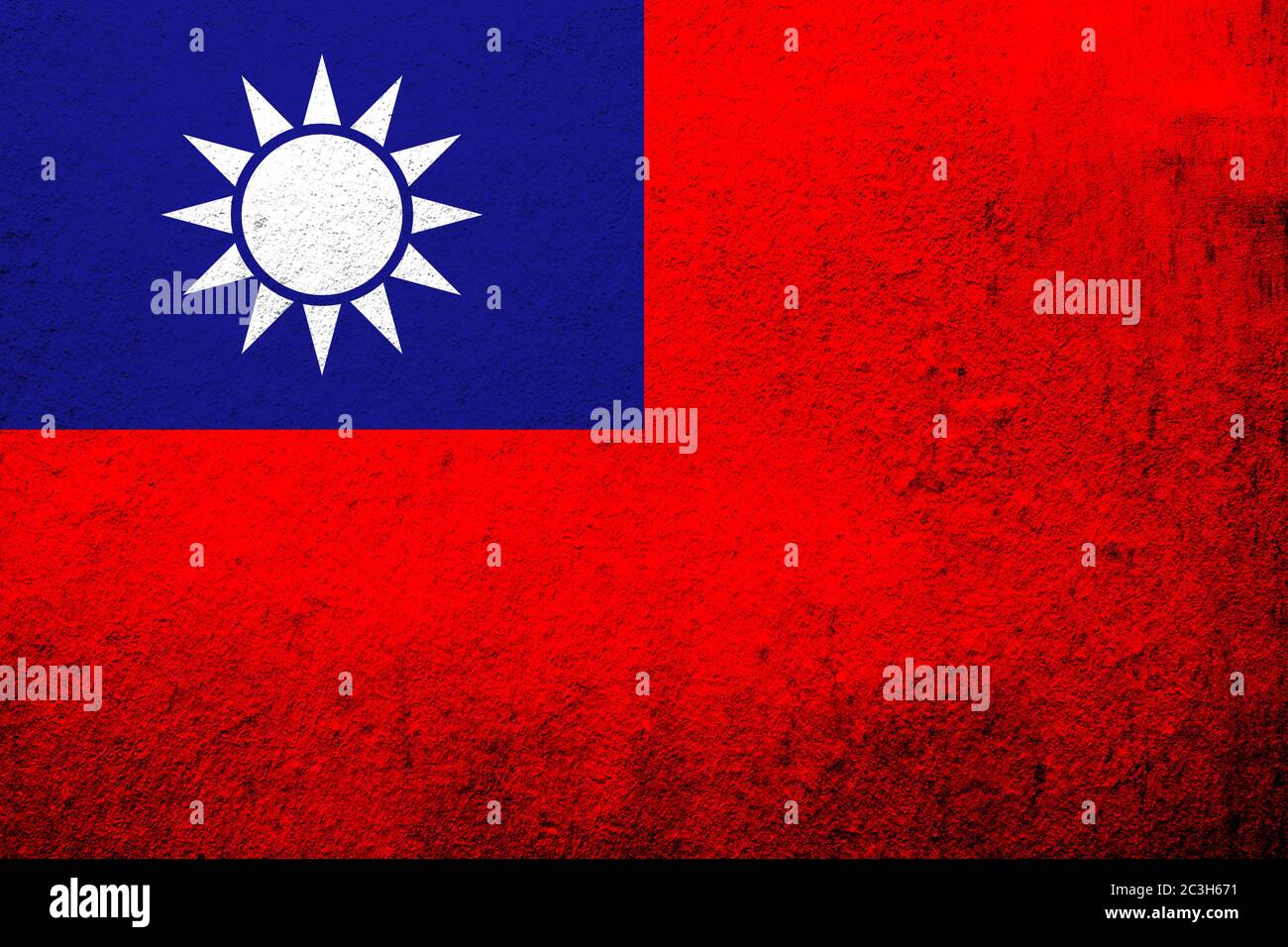 the Republic of China (Taiwan) National flag Blue Sky, White Sun, and a Wholly Red Earth. Grunge background Stock Photo