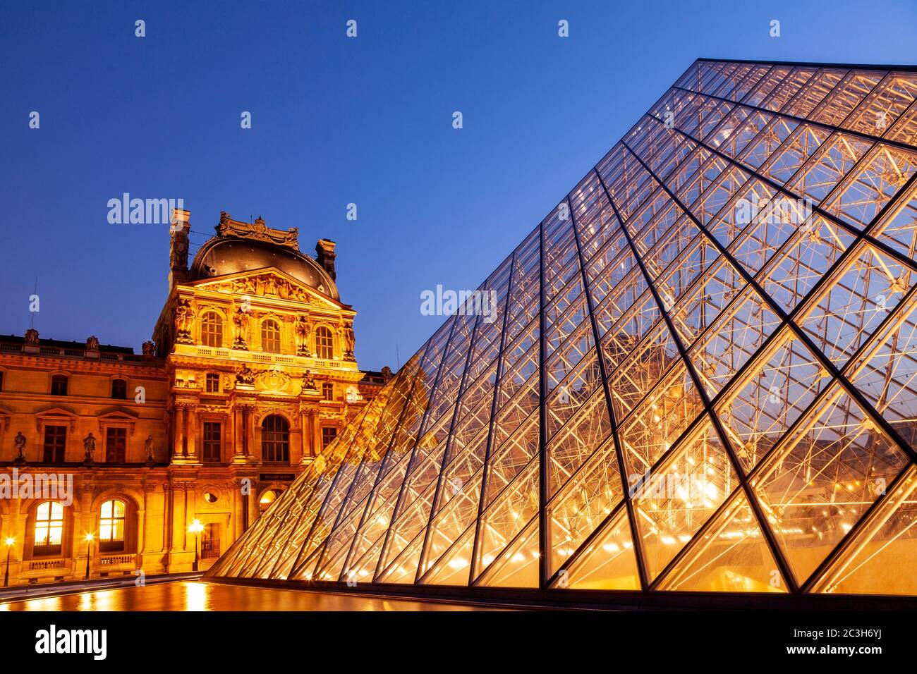 Courtyard of the Louvre, Paris, France, at dusk Stock Photo