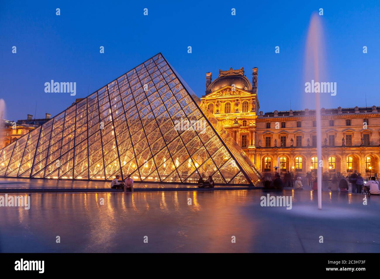 Courtyard of the Louvre, Paris, France, at dusk Stock Photo