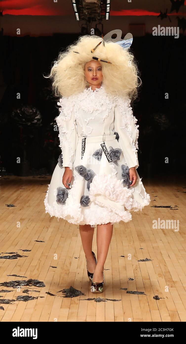 sachin and babi light blue dress Vin & Omi spring/summer 2017 collection catwalk show , Vin& Omi's  collection titled The Dreaming had a dark fairytale vibe to it .The catwalk  was dimmed with red lighting and black origami