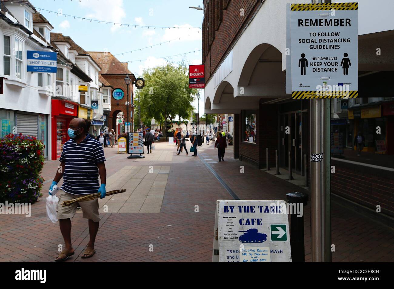 Ashford, Kent, UK. 20 June, 2020. Following the announcement by the government that non essential shops can open, the Ashford town centre high street appears busier than it has in the past few months of the Coronavirus pandemic during the first weekend of shops opening. Photo Credit: Paul Lawrenson/Alamy Live News Stock Photo