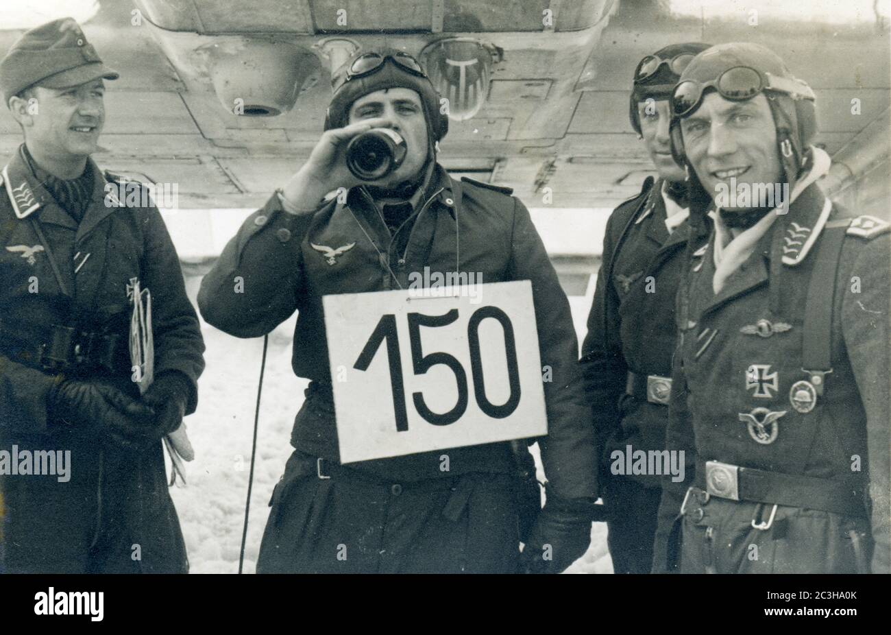 Second World War / WW2 - German reconnaissance aircraft Focke-Wulf Fw 189 pilots celebrating 150 missions, aerial warfare, probably East Front, Russia Stock Photo