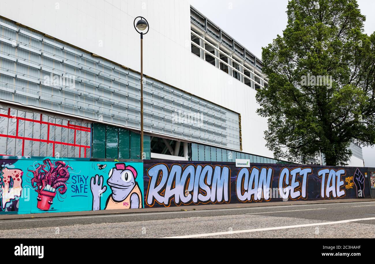 Anti Racism graffiti by Graffiti Collective, Meadowbank sports stadium, Edinburgh, Scotland, UK Stock Photo