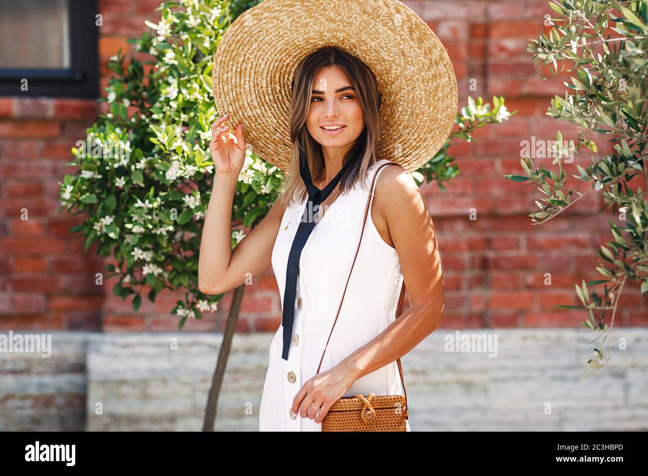 Stylish woman walking hi-res stock photography and images - Alamy