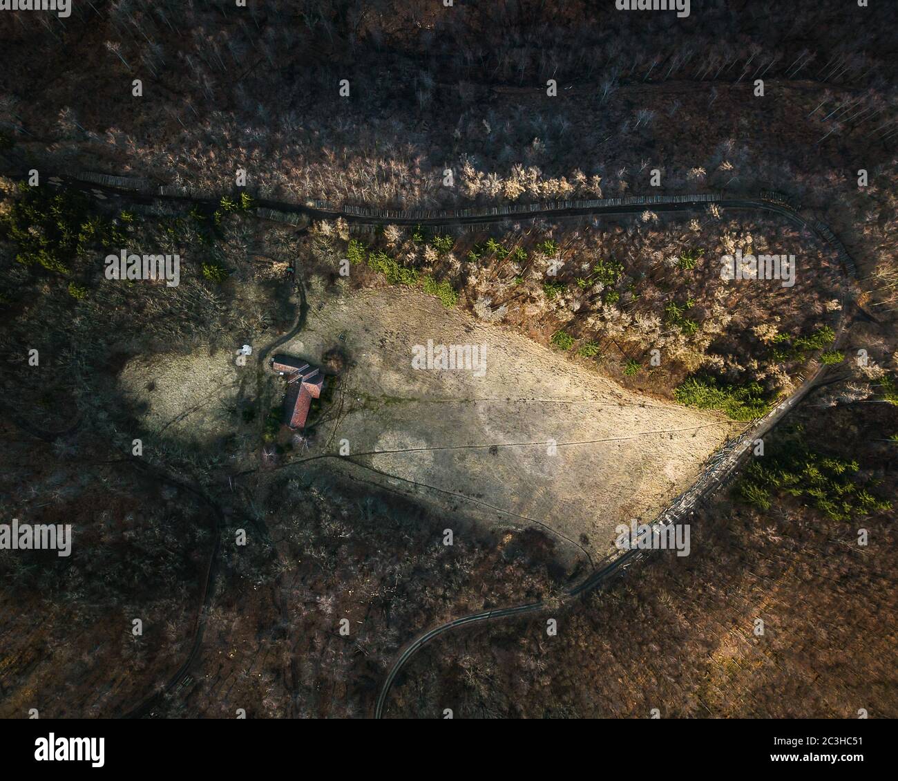 Aerial view of the road surrounded by rocks and trees Stock Photo - Alamy