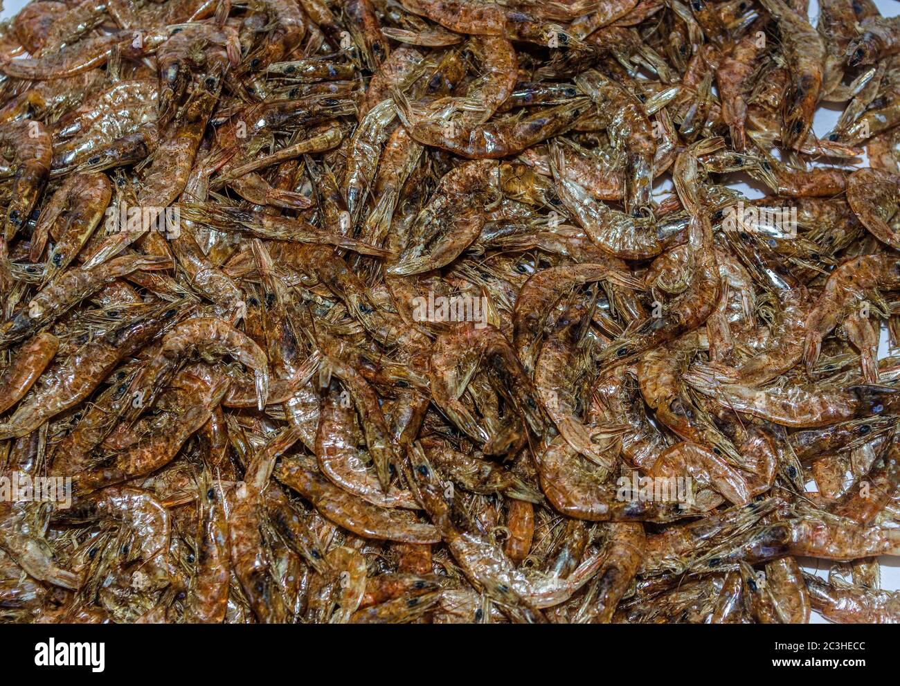Dried prawns on a surface ready to cook Stock Photo Alamy